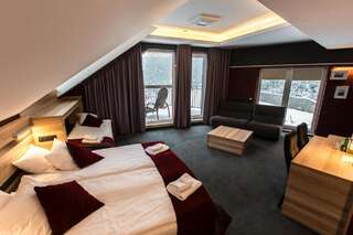 Отели типа «постель и завтрак» Villa Winterpol Карпач Улучшенный четырехместный номер-1
